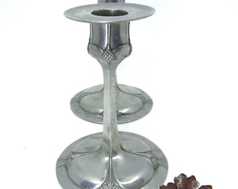 Pair of antique Swedish pewter candle holders by Gamla Santessonska tenngjuteriet 1911 Pine tree relief decor Jugendstil Stockholm Sweden