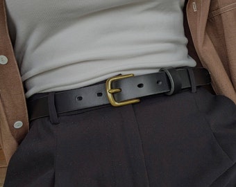 Women's classic, minimalist black leather belt with brass buckle. Hand made in Australia