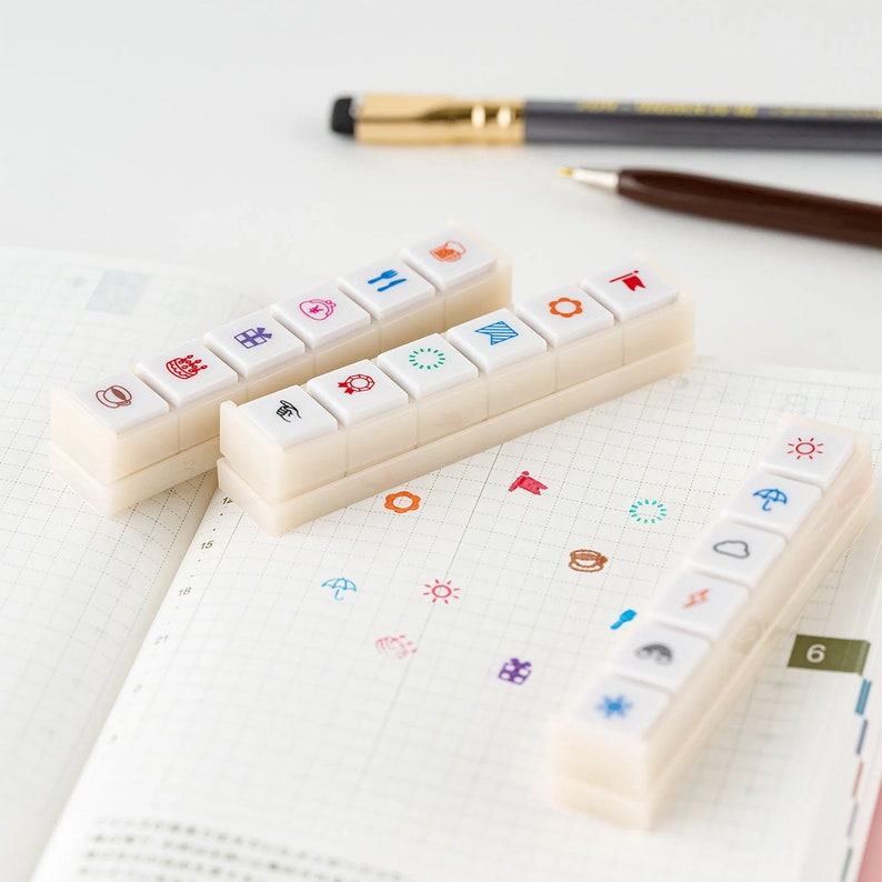 Details of Kodomo No Kao Pochitto6 Push-Button Stamp, a 6-in-1 mini stamp with 6 different emojis, mix and match the stamps to decorate and customize your journal and planner