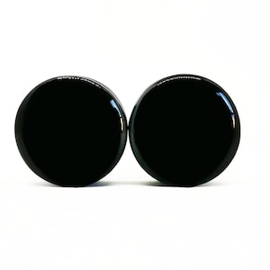 Tapones de pintura negra