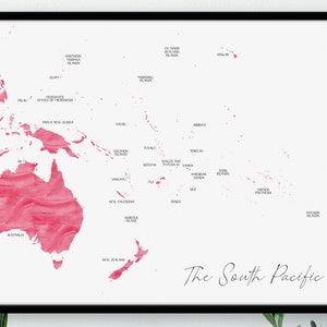 May include: A framed map of the South Pacific, with a watercolour design in red and white. The map shows the islands and countries of the region, with the title "The South Pacific" in elegant script.