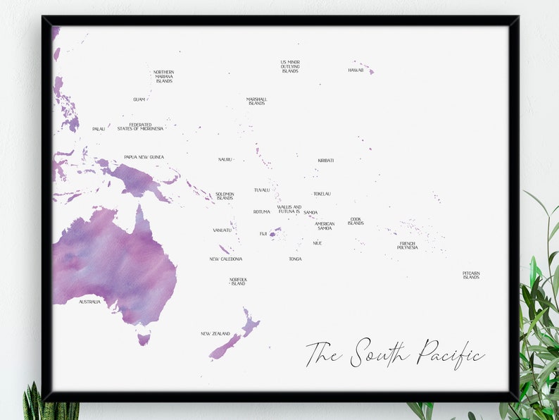 May include: A framed map of the South Pacific, with a watercolour design in purple and pink hues. The map shows countries and islands, each labelled. The words "The South Pacific" are written in a cursive font.