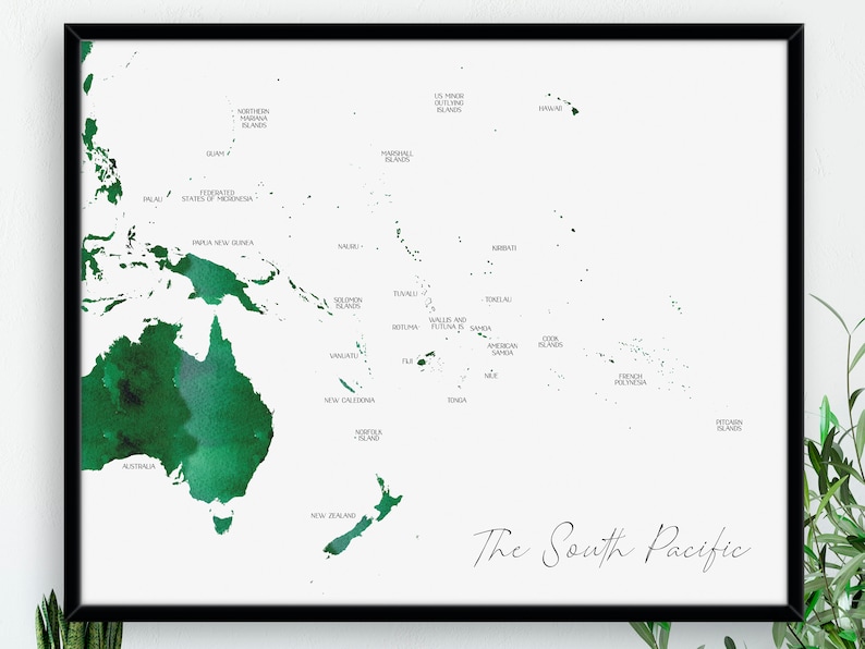 May include: A framed print of a map of the South Pacific, with a green watercolour effect. The map shows countries and islands, each labelled with their names in a minimalist font. The title "The South Pacific" is written in elegant script.