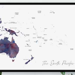 May include: A framed watercolour map of the South Pacific, including Australia and New Zealand. The map uses blue and red hues, with black labels for countries. The title "The South Pacific" is written in cursive script.