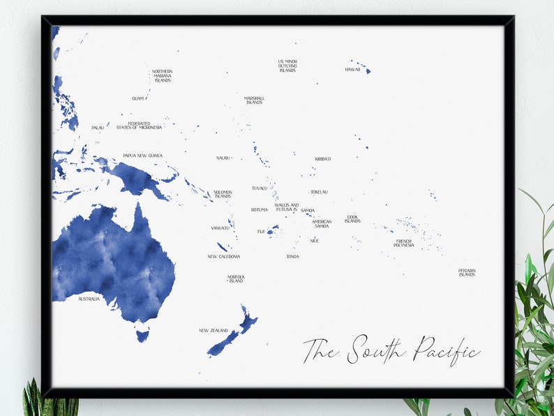 May include: A framed print showing a blue watercolour map of the South Pacific, with country and island names. The title "The South Pacific" is written in a stylish script font.
