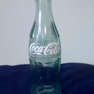 Coca Cola Classic Big 20 Plastic Bottle Full 20 ounces Fluted Bottom