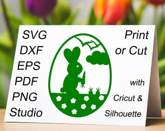 Very cute Easter Bunny eating a carrot in an Easter Egg SVG file to make Easter papercut, cards and gifts with a Cricut or Silhouette