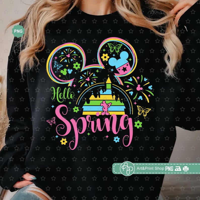 May include: Black sweatshirt with a colorful graphic of Mickey Mouse ears, a castle, and fireworks. The text "Hello Spring" is written in pink letters.