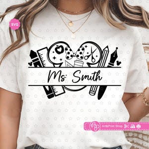 May include: White t-shirt with a black graphic design featuring school-related icons like an apple, scissors, and a pencil. The text "Ms. Smith" is centered below the icons. The design is suitable for teachers.