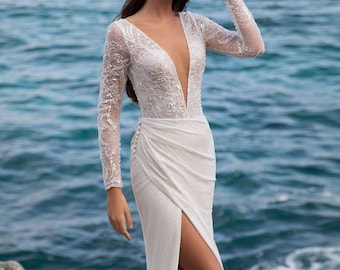 unique sparkly a line wedding dress with deep v neck and open back for a modern bride bridal gown