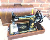 Vintage Singer 28, 28K handcrank sewing machine with bentwood case.