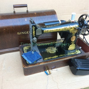 Antique Singer 127K electric sewing machine with Sphinx decals