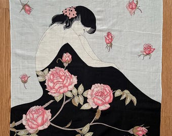 May include: Square handkerchief featuring an art deco illustration of a woman with black hair and a pink bow, surrounded by pink roses. The woman is wearing a black dress. The background is light blue.