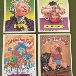 Topps - Garbage Pail Kids - Dollar Bill 73b, Louise Squeeze 253b, Brushed-Off Brenda 214b, Bernie Burns 231b - Lot of (4) - Vintage - 1980s