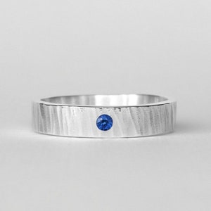 Hammered Mens band ring in sterling silver with sapphire . Personalised textured wedding band Blue stone . Christmas gifts Husband Birthday image 1