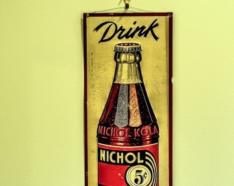 Nichol Kola sign