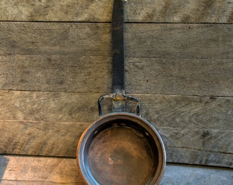 Antique copper sauce pan