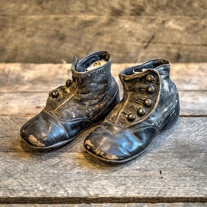 Early button up children&#39;s shoes