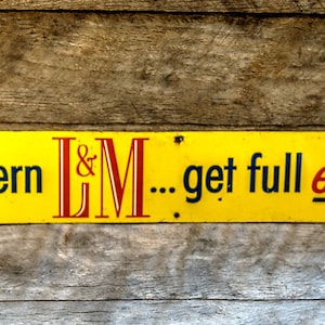 Cartel publicitario de L & M