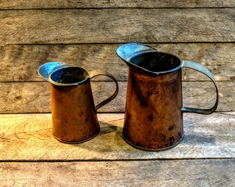 Antique copper measuring cups