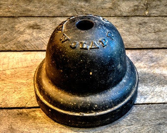 Antique cast iron string holder