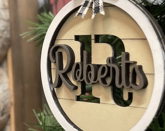 Custom Family Name Ornament, Layered Last Name Ornament, Laser Cut Initial with Buffalo Plaid Bow, Round Framed Ornament with Neutral Colors