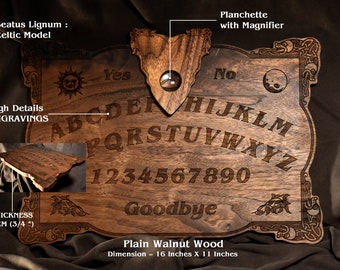 May include: A wooden Ouija board with a planchette and a magnifying glass. The board is made of plain walnut wood and has a Celtic design. It measures 16 inches by 11 inches and is 3/4 inch thick.