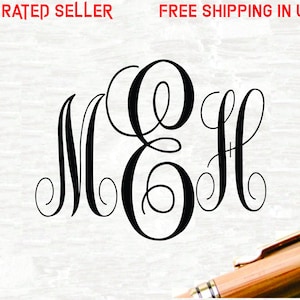 May include: A black and white monogram with the letters M, E, and H in a script font. The letters are intertwined and have a decorative flourish.