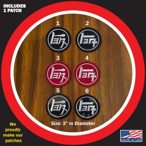 May include: Six embroidered patches featuring a Japanese logo in different colors. The patches are 3 inches in diameter and are displayed on a wooden background. The text "INCLUDES 1 PATCH" is at the top of the image. The text "Size: 3" in Diameter" is at the bottom of the image. The text "MADE IN USA" is at the bottom right of the image.