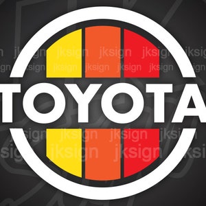 Peut inclure: Le logo de Toyota est un cercle blanc avec un motif rouge, orange et jaune &agrave; l'int&eacute;rieur. Le mot "TOYOTA" est &eacute;crit en lettres blanches au centre du cercle.