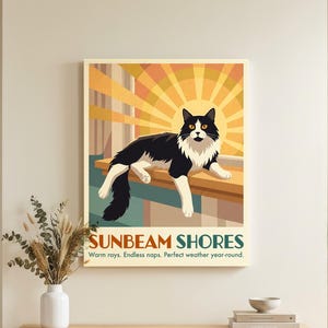 May include: A rectangular wall art print featuring a black and white cat lying on a ledge against a stylized yellow and orange sunburst background. The text reads SUNBEAM SHORES, Warm rays. Endless naps. Perfect weather year-round.