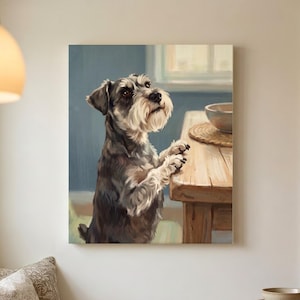 May include: A wall art print featuring a painting of a grey and white Schnauzer dog standing on its hind legs, resting its front paws on a wooden table. The dog looks upward towards a bowl placed on the table surface in a bright, indoor setting.