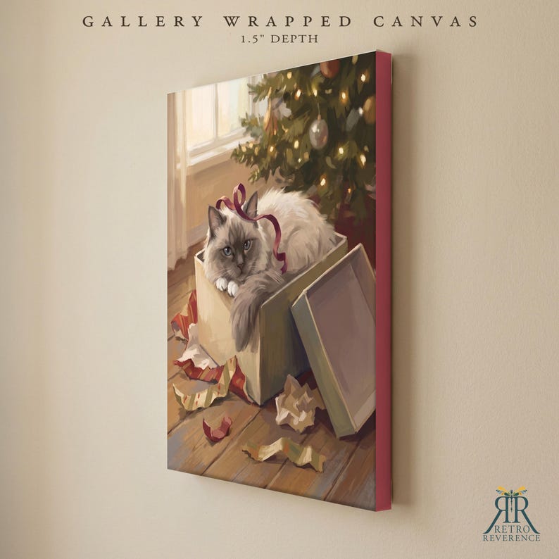 May include: A gallery wrapped canvas with a 1.5 inch depth featuring a painting of a fluffy white cat with dark points sitting inside an open gift box. The cat has a red ribbon draped over its head. A Christmas tree with lights is in the background.
