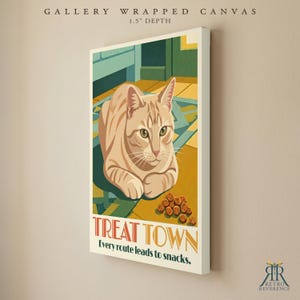 May include: A gallery wrapped canvas with a 1.5 inch depth featuring a tan tabby cat resting on a floor with scattered treats. The artwork includes the text TREAT TOWN and Every route leads to snacks in a bold, stylized font design.