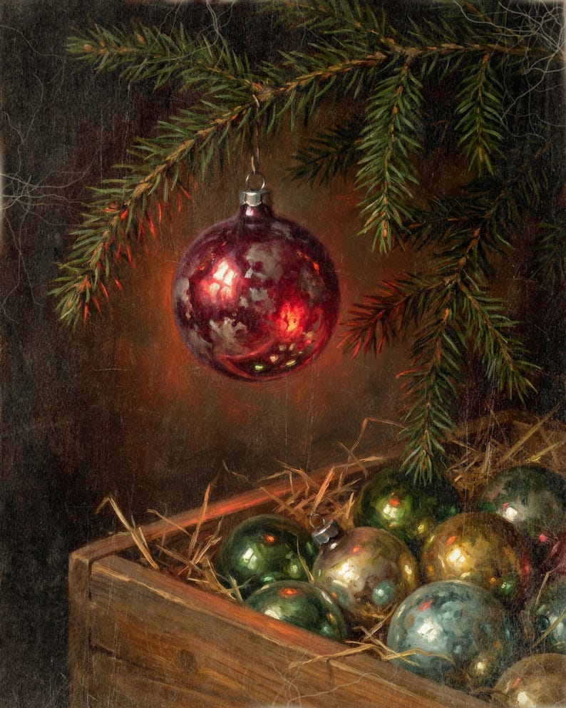 May include: A shiny, deep red glass Christmas bauble hangs from a green pine branch. Below, a wooden crate filled with straw contains several additional round glass baubles in various shades of green, gold, and silver with a weathered finish.