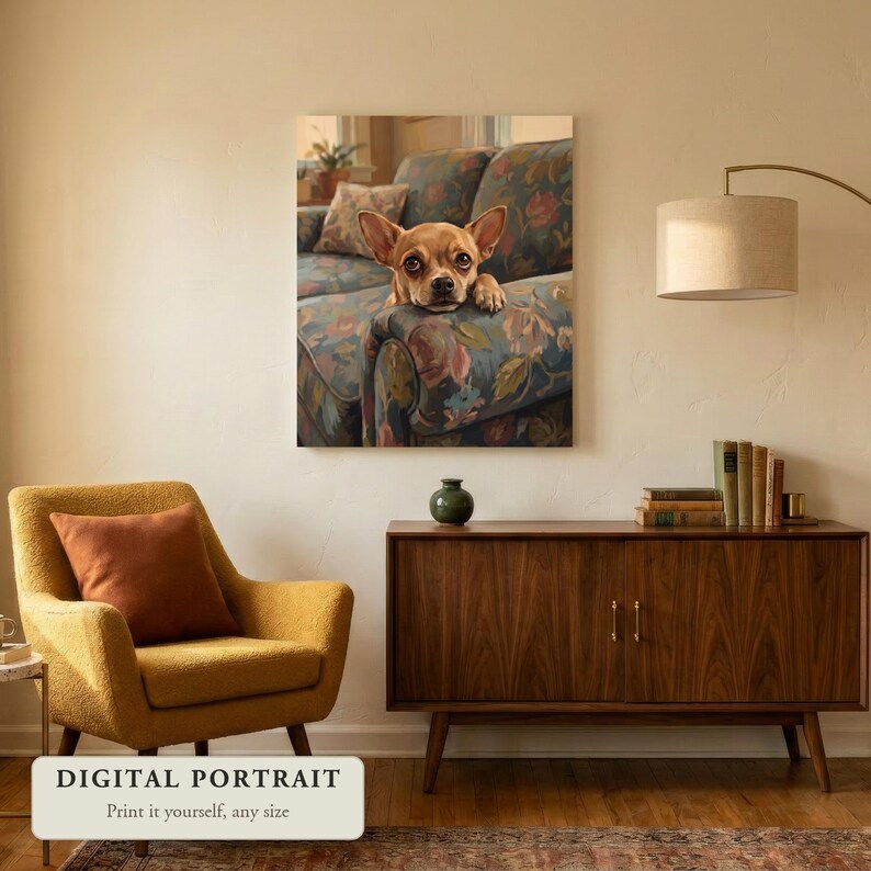 Custom dog portrait of a dog with sad eyes resting on a sofa arm, hung on a wall in a living room, shown as a digital file you print yourself