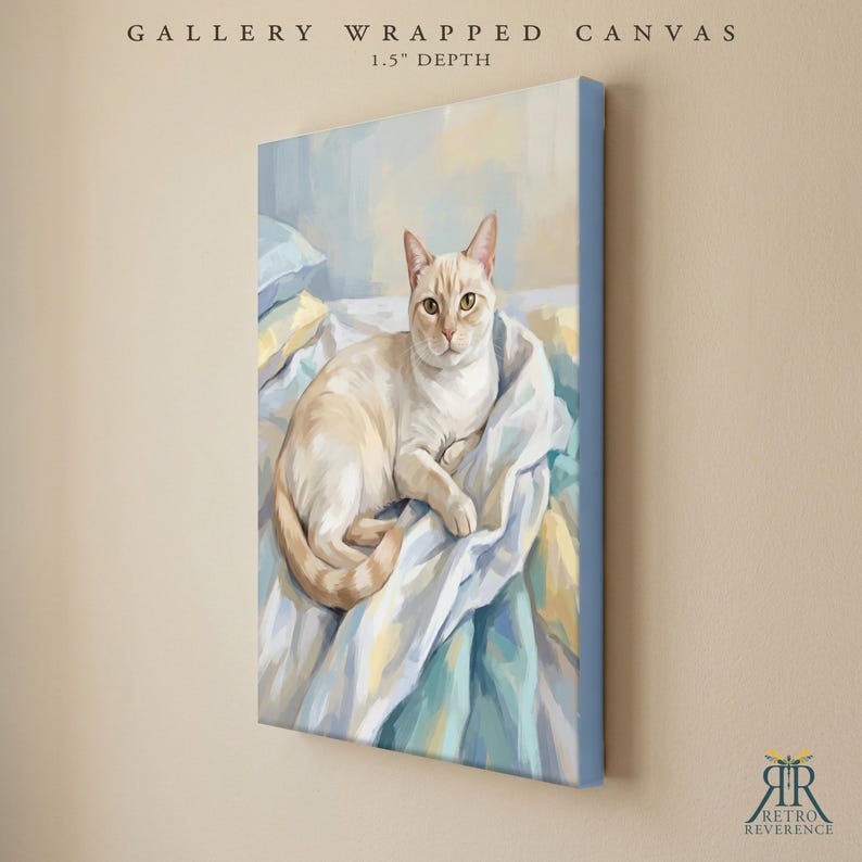 May include: A gallery wrapped canvas with a 1.5 inch depth featuring a painting of a cream-colored cat resting on soft, light blue and white bedding. The artwork displays a feline with pointed ears and light fur, rendered in a painterly style.