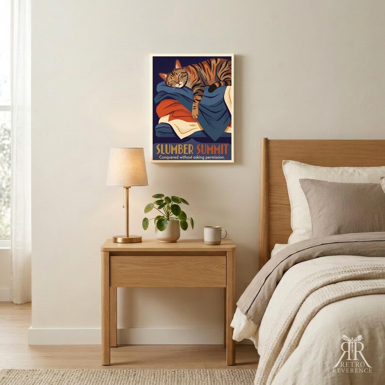 May include: A rectangular wall art print featuring a brown tabby cat sleeping on a pile of folded blankets. The text reads SLUMBER SUMMIT and Conquered without asking permission. The color palette includes navy blue, orange, and cream tones.