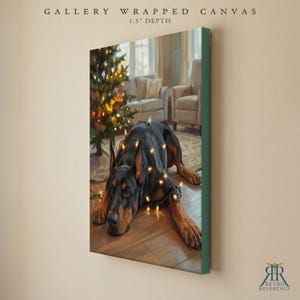 May include: A gallery wrapped canvas with a 1.5 inch depth featuring a black and tan Doberman dog lying on a wooden floor, draped in glowing string lights. In the background, a decorated Christmas tree and armchairs are visible.