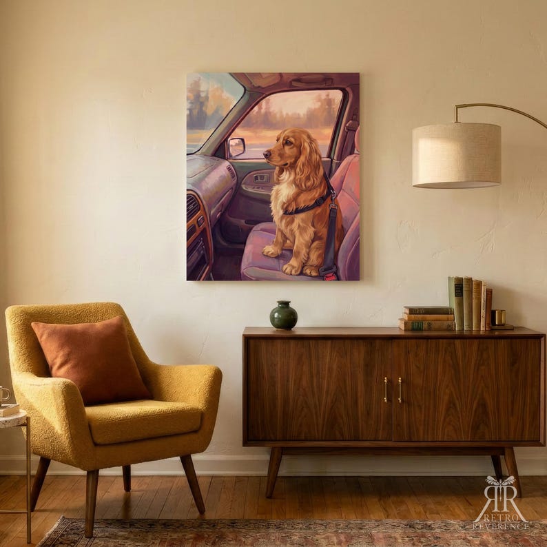 May include: A rectangular wall art print featuring a golden-colored dog sitting in the passenger seat of a car. The dog is wearing a black harness and is positioned against a backdrop of a car interior with a view of a sunset landscape outside.