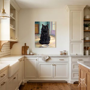 May include: A rectangular wall art print featuring a fluffy black cat with bright yellow eyes sitting on a light-colored floor in front of a bowl. The cat is positioned in the center of the artwork, which is displayed on a kitchen wall.