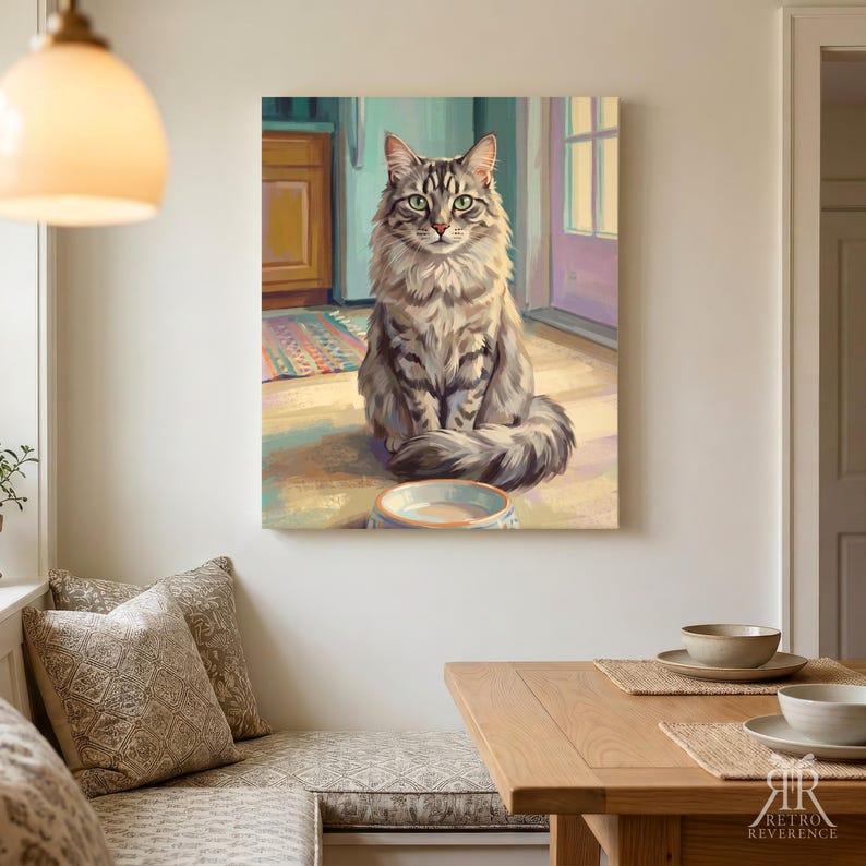 May include: A wall art print featuring a long-haired grey tabby cat sitting on a floor in front of an empty bowl. The cat has green eyes and dark stripes, positioned in a kitchen setting with a colorful rug, wooden cabinets, and a purple door.