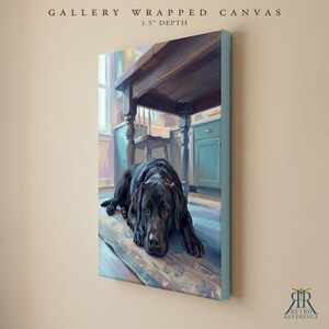 May include: A gallery wrapped canvas with a 1.5 inch depth featuring a painting of a black Labrador retriever lying on a floor beneath a wooden table. The scene includes a window and teal cabinets in the background, rendered in a painterly style.