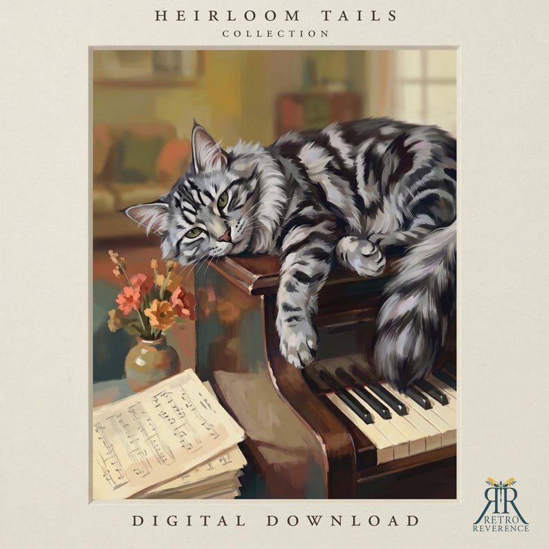 May include: A digital art print titled HEIRLOOM TAILS COLLECTION featuring a grey and black tabby cat resting on a piano. Beside the cat is a small vase with orange flowers and a stack of sheet music. The text DIGITAL DOWNLOAD is at the bottom.