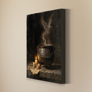 May include: A rectangular canvas wall art print featuring a dark, atmospheric scene of a black iron cauldron on a stone surface. A ghostly white bird emerges from the cauldron as smoke, accompanied by three lit candles and scattered dried herbs.