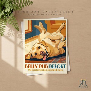 May include: A fine art paper print featuring a yellow Labrador retriever lying on its back with its tongue out. The text reads BELLY RUB RESORT and The locals insist on extended stays. The print is smooth, matte, and archival quality.