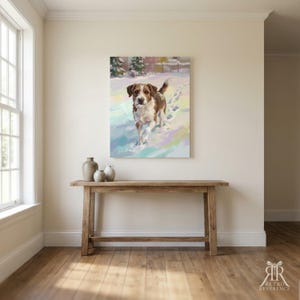 May include: A rectangular wall art print featuring a painting of a brown and white dog walking through a snowy landscape. The dog has floppy ears and is depicted with visible brushstrokes. The background shows soft pastel colors of blue, purple, and white, suggesting a winter scene with trees in the distance.