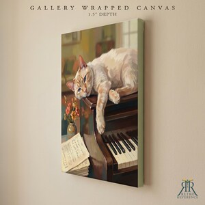 May include: A gallery wrapped canvas with a 1.5 inch depth featuring a painting of a light orange cat resting on a dark brown piano. Beside the piano sits a small vase with orange flowers and a stack of sheet music. The text reads Gallery Wrapped Canvas.
