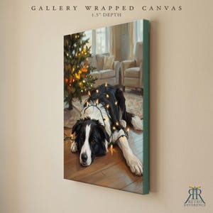 May include: A gallery wrapped canvas with a 1.5 inch depth featuring a painting of a black and white dog lying on a wooden floor. The dog is draped in glowing string lights near a decorated Christmas tree and armchairs in a living room.