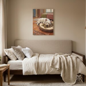 May include: A rectangular wall art print featuring an oil painting of a white West Highland White Terrier dog sleeping on a round, tan-colored pet bed. The dog rests its head on a small, plaid-patterned blanket inside a room with wooden floors.